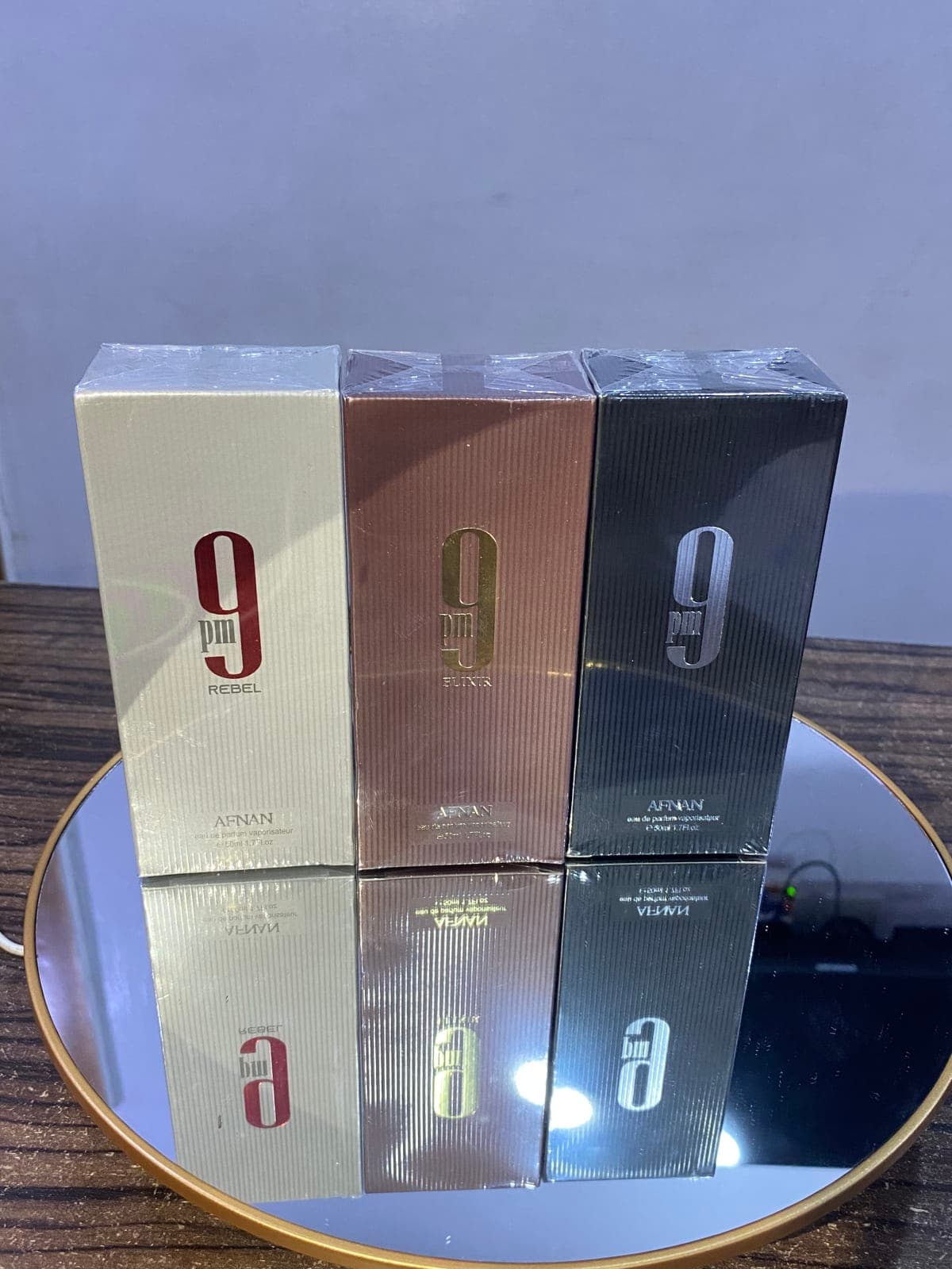 9 PM Rebel (Eau de Parfum), 9 PM Elixir (Parfum Intense) and 9 PM (Black / Original Eau de Parfum)